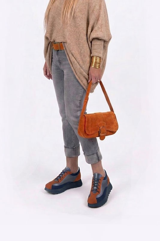 Dress sneakers in terracotta orange, denim blue and navy blue leather with thick rubber soles and round toe - Worn view
